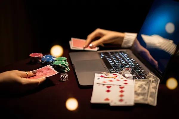 A player using their smartphone during a festive local event, representing 786BED’s fully mobile-friendly casino.